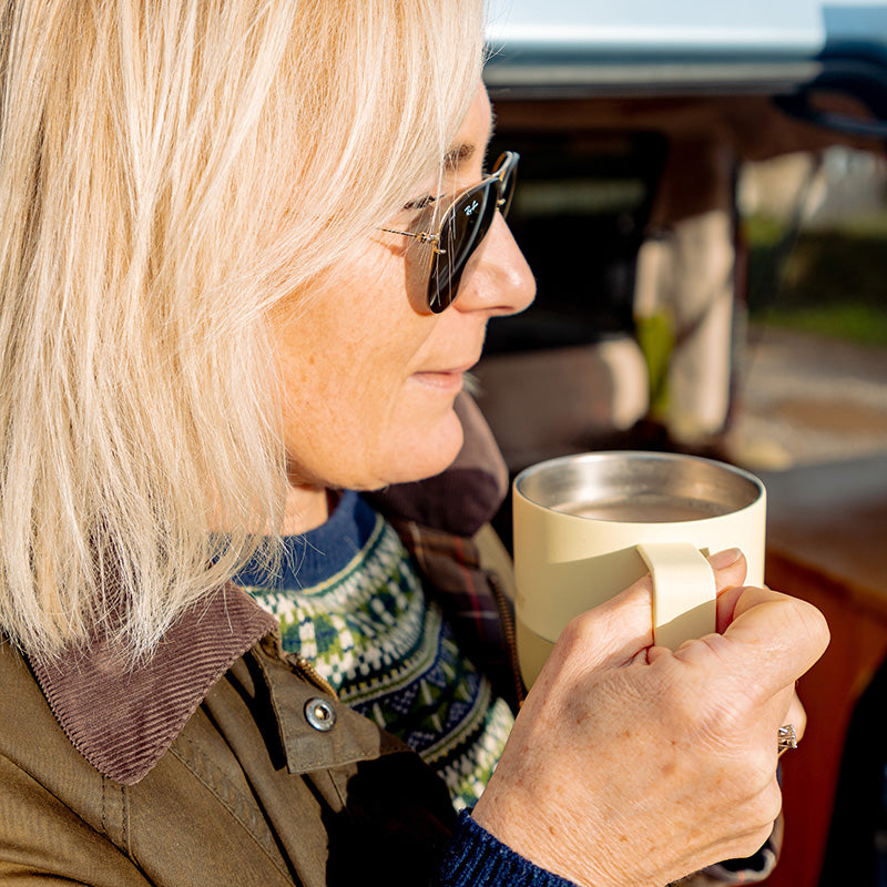 12oz-rise-mug-t9 12oz_rise_coffee_mug_wax_yellow_woman_drink_closeup_square.jpg