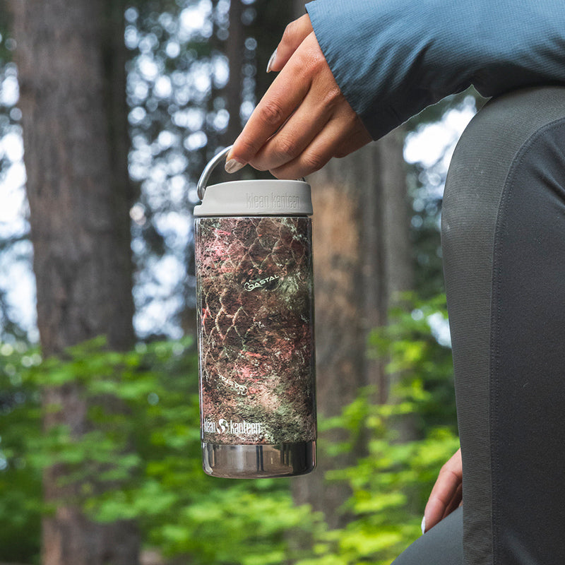 12oz-tkwide-with-twist-cap-mossy-oak-l3 12oz_tumbler_mossyoak_rainbowtrout_hand_closeup_square.jpg