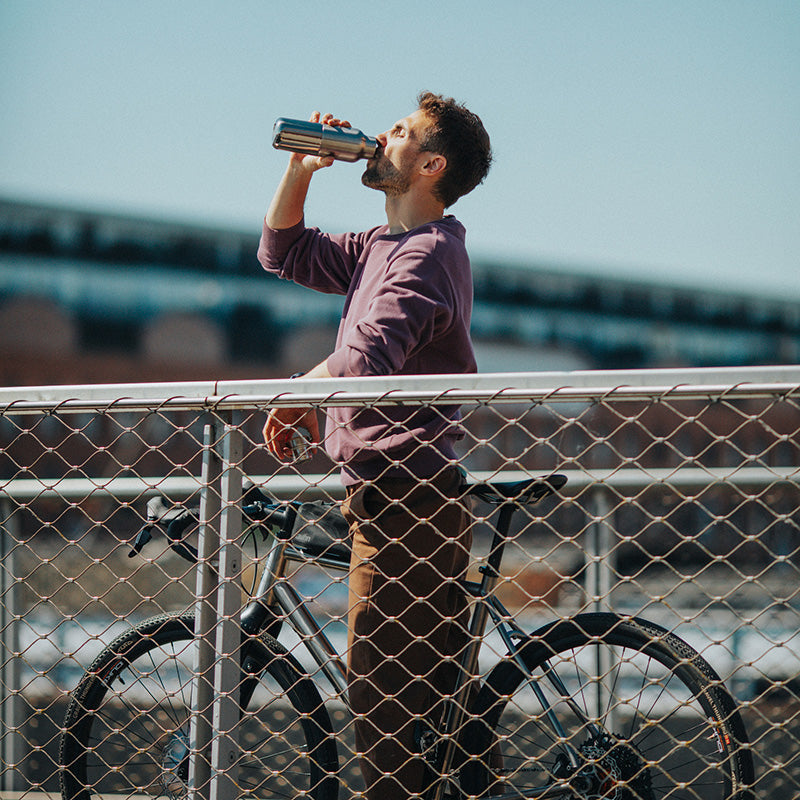 20oz-rise-reflect-with-bamboo-cap-q2 16oz_rise_reflect_man_bike_square.jpg