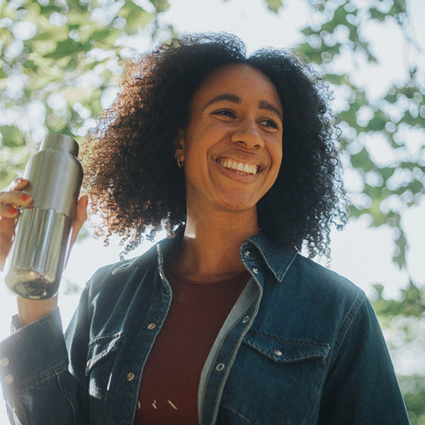 bring-your-own-party-kit-tumblers-and-cocktails-z8 16oz_rise_reflect_woman_smile_square.jpg