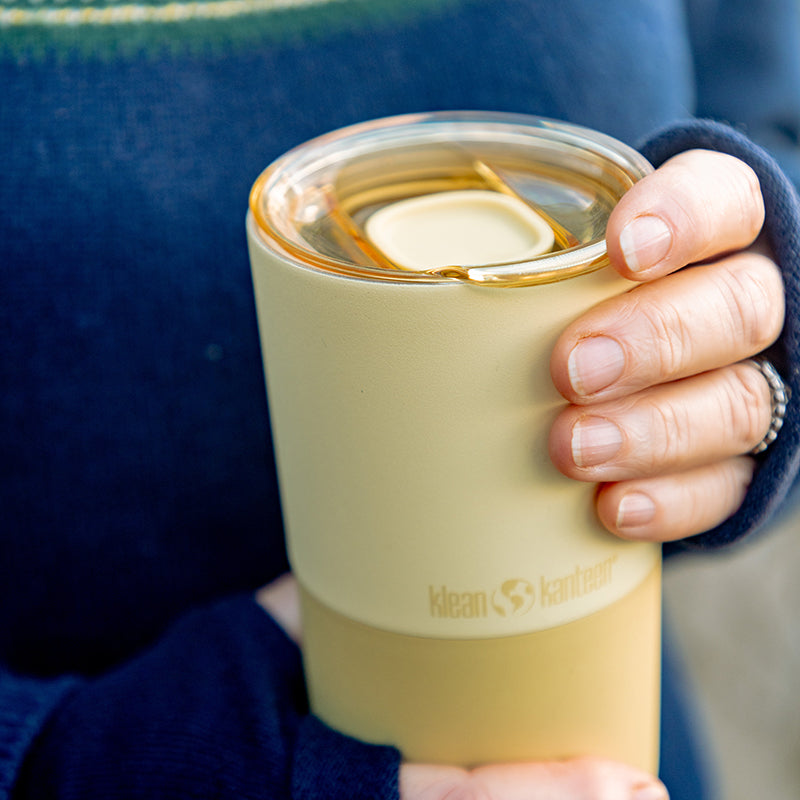 daily-on-the-go-set-w8 16oz_rise_tumbler_wax_yellow_closeup_hand_lid_square.jpg