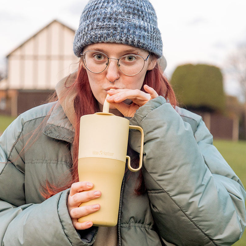 26oz-rise-tumbler-with-straw-lid-p7 26oz_rise_rumbler_straw_wax_yellow_woman_sip_square.jpg
