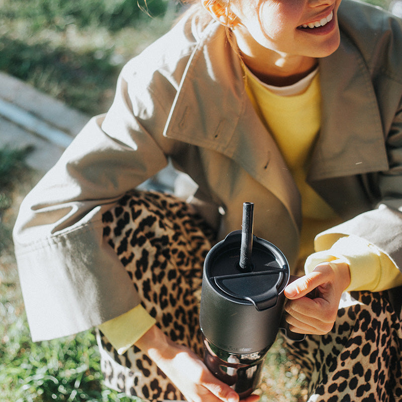 26oz-rise-tumbler-with-straw-lid-p7 26oz_rise_tumbler_black_woman_topview_square.jpg