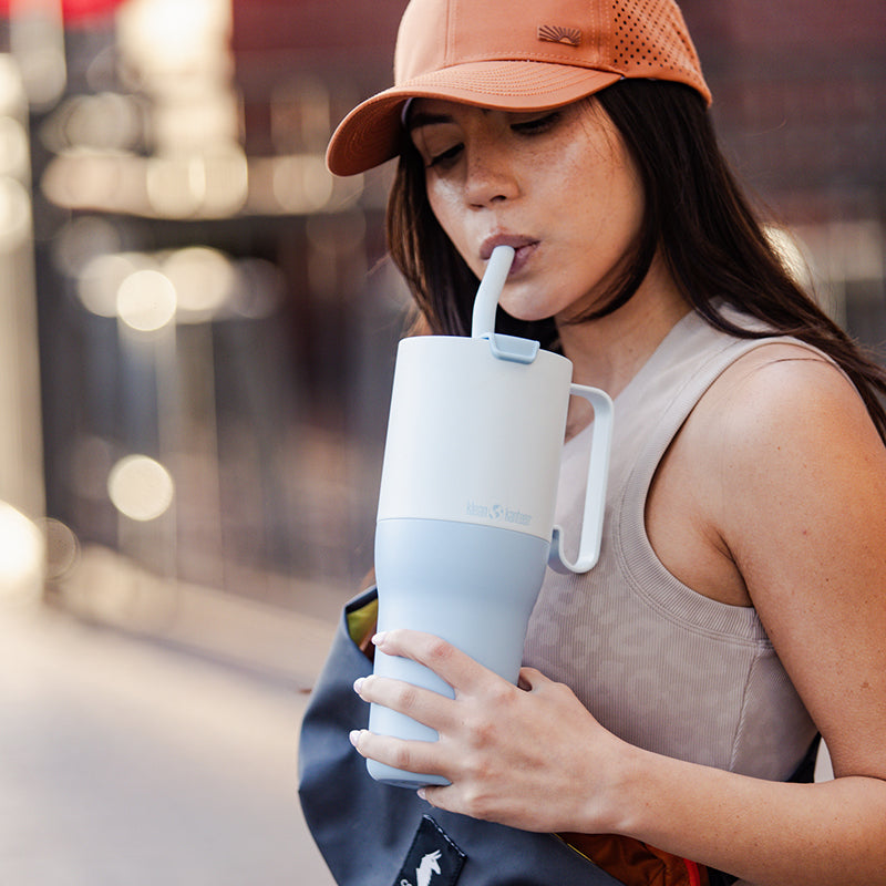 36oz-rise-tumbler-with-straw-lid-n7 36oz_rise_tumbler_straw_girl_sip_square.jpg