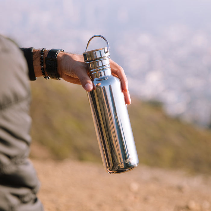 27oz-reflect-with-bamboo-cap-g6 K27SSLRF-MS-BAMBOO_reflect_bottle_hand_lifestyle.jpg