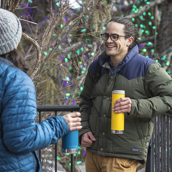 20oz-tkwide-with-cafe-cap-l0 tkwide_20oz_insulated_tumbler_cafe_winter_man_coat_yellow_square.jpg