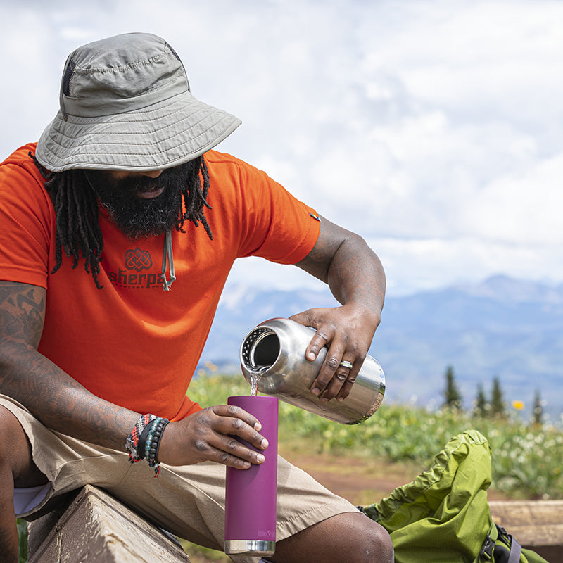 64oz-tkwide-with-loop-cap-t0 tkwide_64oz_bottle_backpacker_mountains_filling_square.jpg