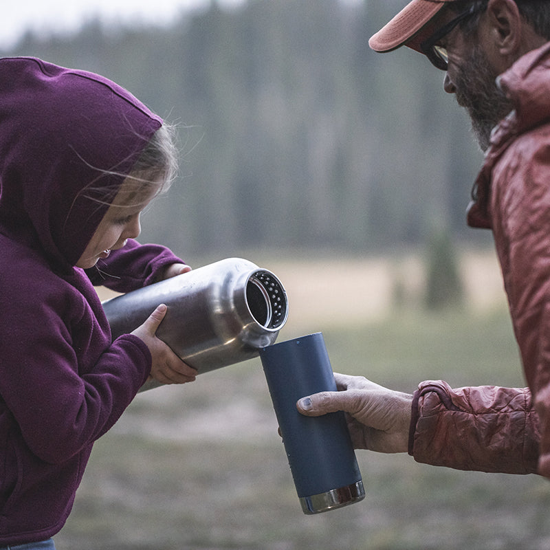 64oz-tkwide-with-loop-cap-t0 tkwide_64oz_bottle_girl_dad_filling_square.jpg